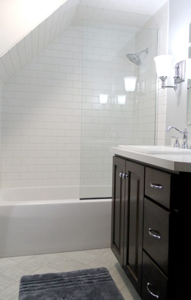 White subway tile shower with bathtub, H.J. Martin and Son