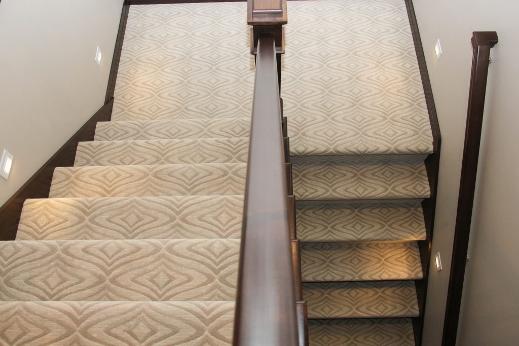 Cream and tan patterned staircase carpet, 2018 showcase of homes, H.J. Martin and Son