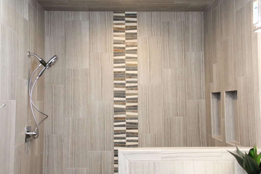 tiled shower, accent tile strip, green, black, and ivory tile, 2018 showcase of homes, H.J. Martin and Son
