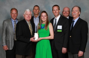 Presentation of Environmental Stewardship Award: [L-R] Kemp Harr, Floor Focus magazine [judge]; Bill Croswell, chairperson of Starnet board of directors; Dave Kitts, Mannington Mills [judge]; Rachel Weber, H.J. Martin; Gary VandenLangenberg, H.J. Martin; Carlton Billingsley, chairperson of Starnet environmental issues committee; and Bob Peoples, CARE [judge] 