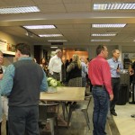 coworkers gather to see the new showroom, H.J. Martin and Son