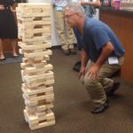 Jeff Giordano plays Jenga at the event, H.J. Martin and Son