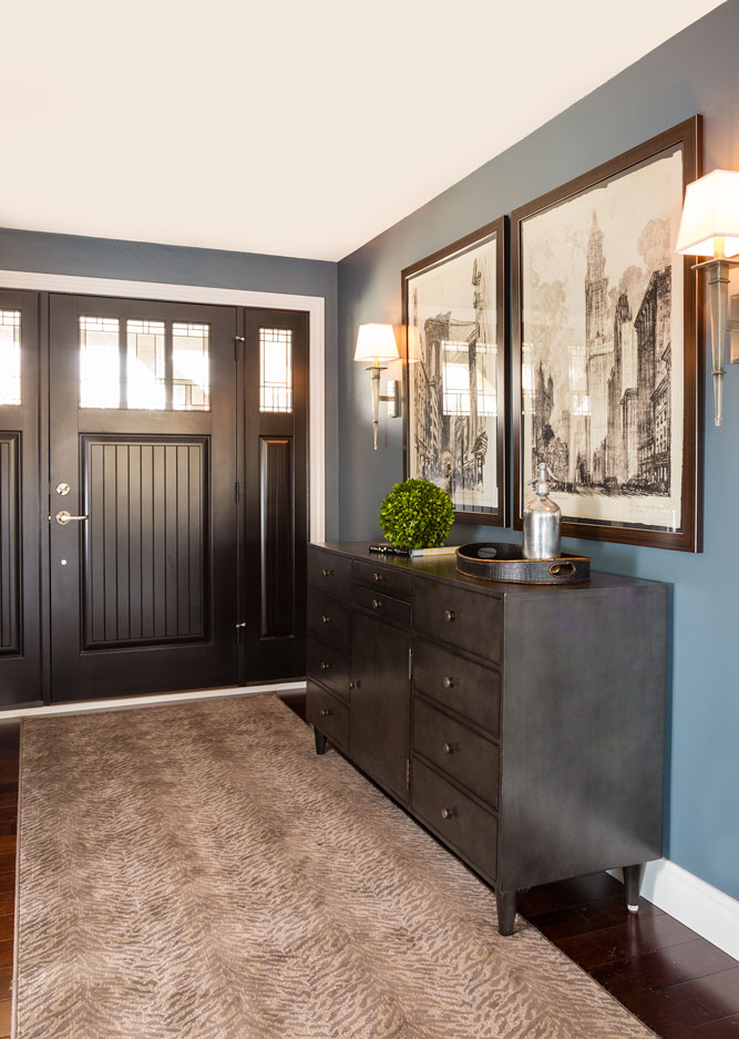 Tan zebra patterned area rug in entry way