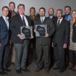 The H.J. Martin and Son team poses with the company's two AGC of Wisconsin awards