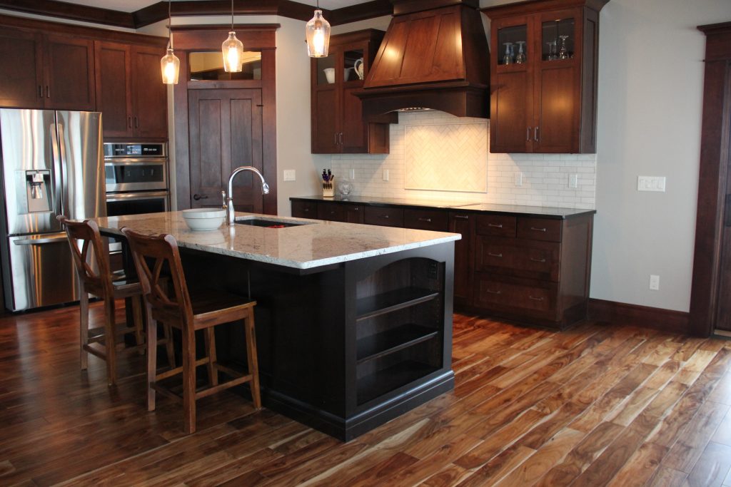 Hardwood kitchen floor with white tile backsplash, H.J. Martin and Son