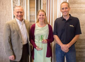 Fred Williamson (left) of Starnet Worldwide Commercial Flooring Partnership congratulates Rachel Weber (center) and Gary VandenLangenberg (right) of the H.J. Martin and Son commercial flooring team on the company’s 2017 Gold Starnet Environmental Achievement Award on Sept. 26, 2017.