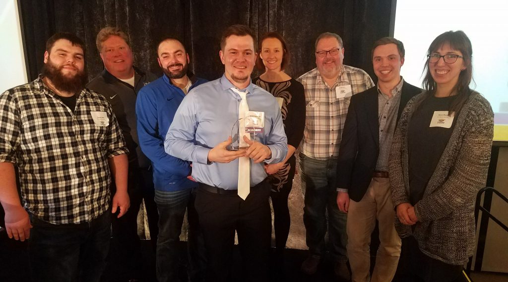 Members of the H.J. Martin and Son team celebrated with Tompkins on March 15 in Milwaukee. On hand were (L-R) Garret Nero, Mike Watermolen, Brandon Pecho, Wyatt Tompkins, Nicole Jensky, Craig Nero, Brandon Schmitz and Alyssa Bloechl.