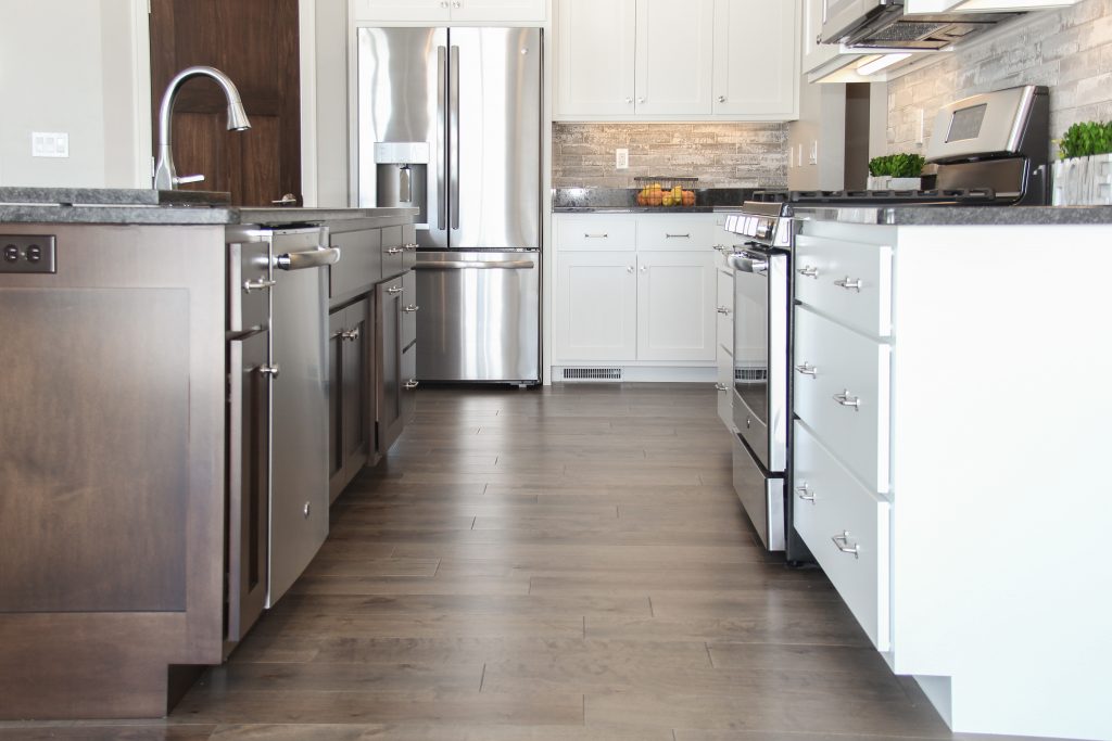 Urban brick kitchen backsplash, hardwood kitchen floor, 2018 showcase of homes, H.J. Martin and Son