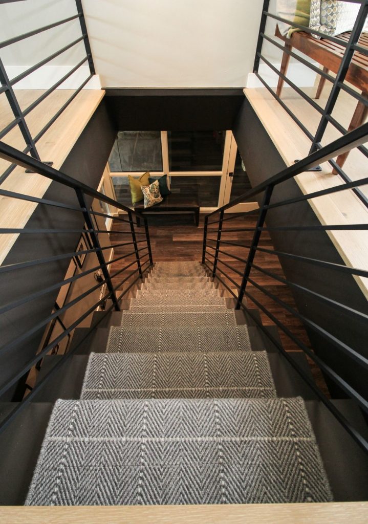 patterned staircase with plaid carpet runner